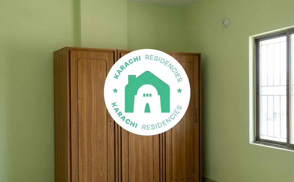 Green room with wooden three-door wardrobe - Garden East 3 bed apartment