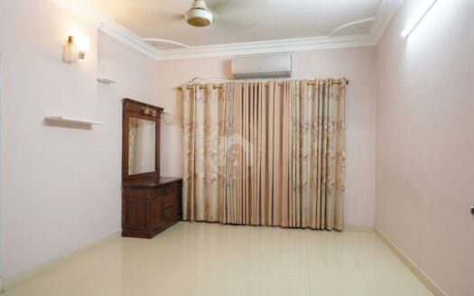 Primary bedroom with double bed and air conditioner, Soldier Bazar flat