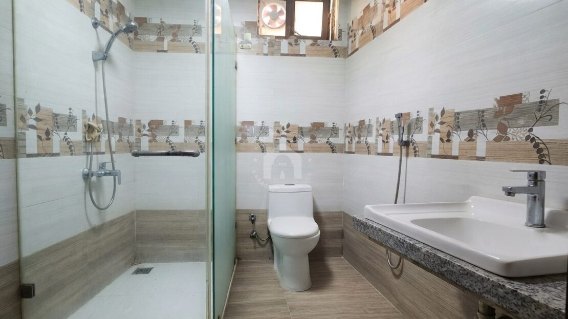 Washroom with shower in Sharafabad apartment