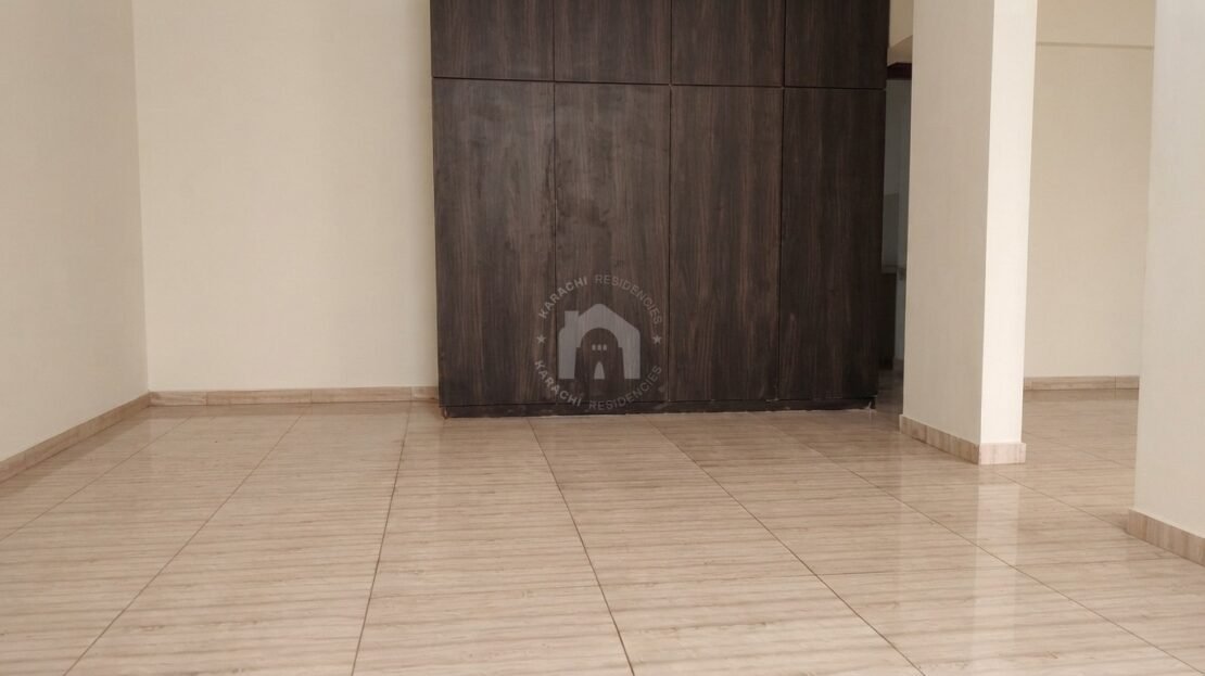 PECHS Block 3 3-Bedroom Flat - bedroom corner with dark wardrobe