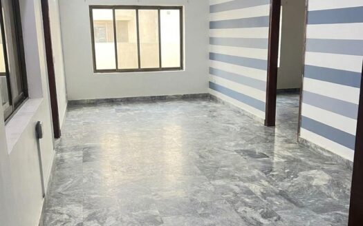 Empty living room, 4 bed luxury apartment for sale, PECHS Block 3, Karachi