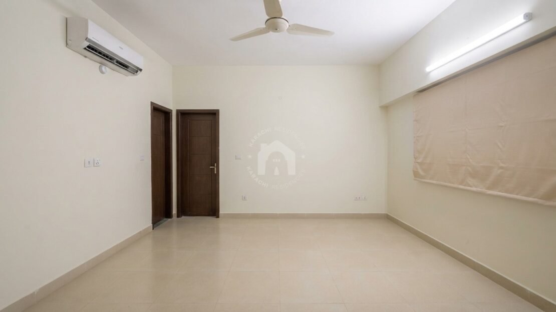Bedroom with built-in wardrobe in PECHS Block 2 furnished apartment, Karachi Residencies