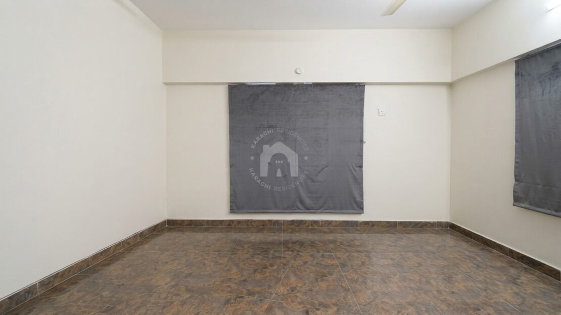 Bedroom with tiled flooring in PECHS Block 2 furnished apartment, Karachi Residencies