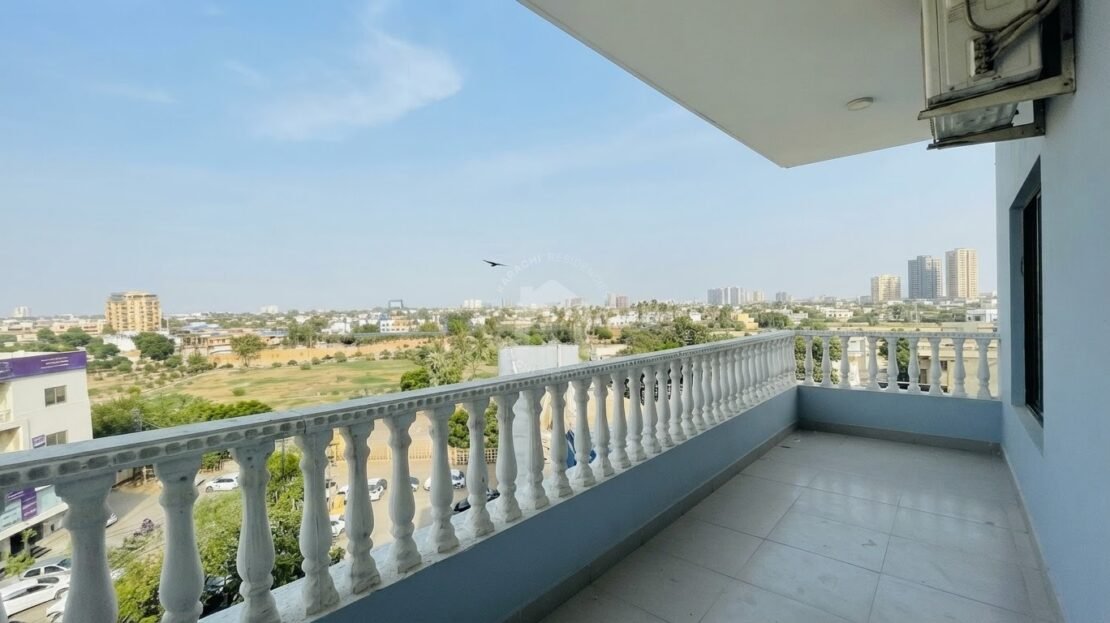 Roof terrace balcony with Karachi skyline view, PECHS Block 2 furnished apartment, Karachi Residencies